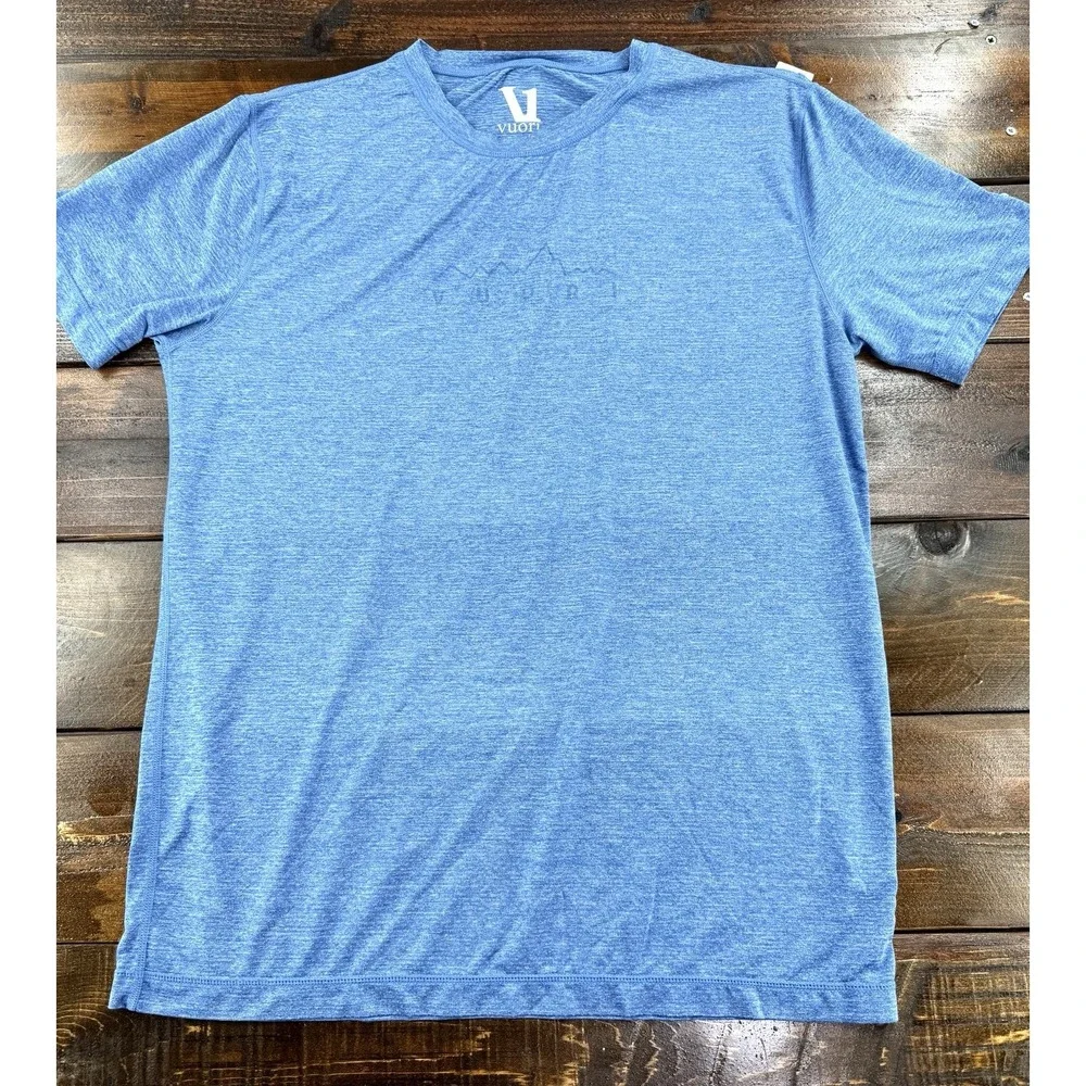 Vuori Tradewind Performance Shirt Mountain Logo Short Sleeve Blue Heather Mens L